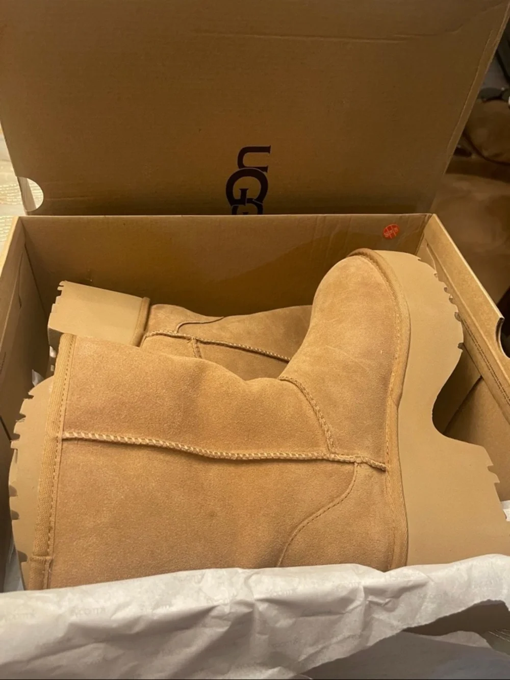 UGG Women's classic short new heights bootie’s size 7